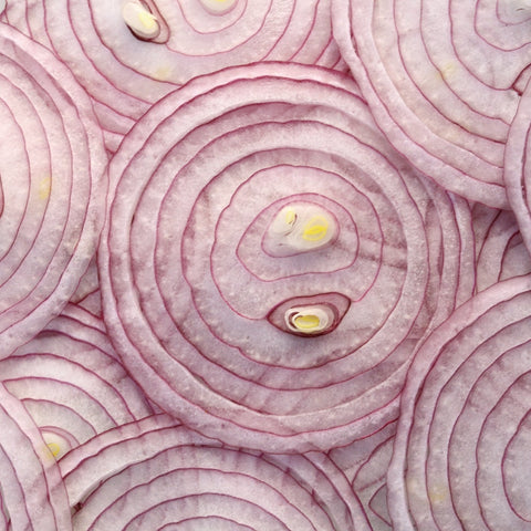 Red onions cut with Slicing blade on La Mandoline Michel BRAS